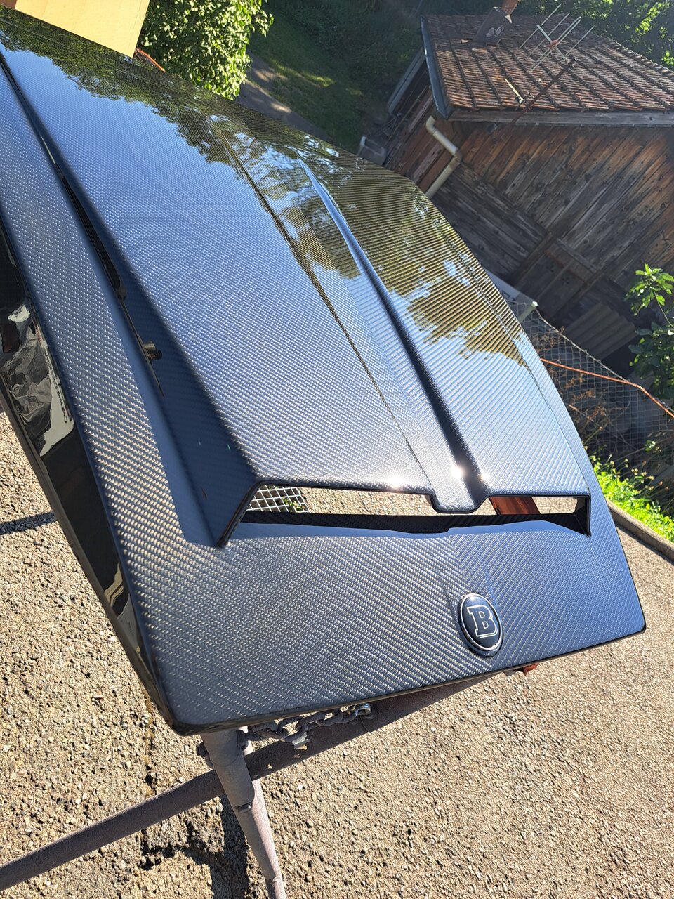 Réparation prise daire capot g550 brabus